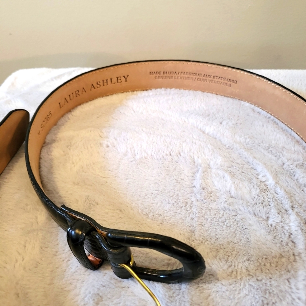 Women's leather black belt sized 30"-33". Laura Ashley.